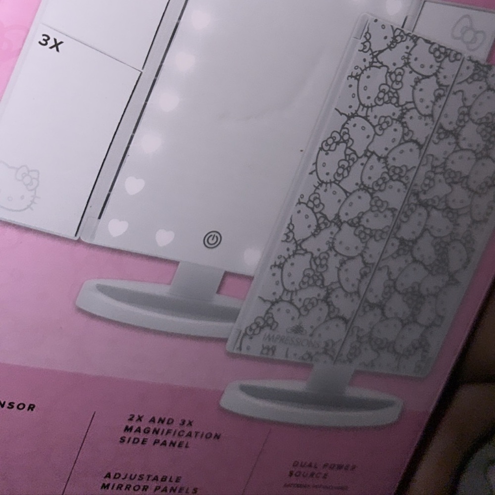 Lights up, trifold, and includes magnifying mirrors!’